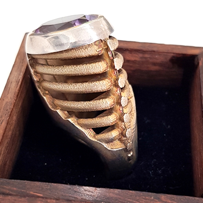 'Amethyst Backbone Cocktail Ring' by artist Inness Thomson